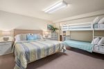 Also downstairs you`ll find the fifth bedroom that includes a king bed and another bunk bed. 